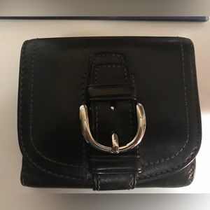 Coach leather Womens wallet, snap closure with outside coin pocket.